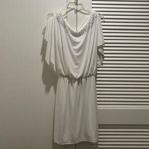 White Tiana B dress, perfect for any occasion such as casual, dinners, and more!